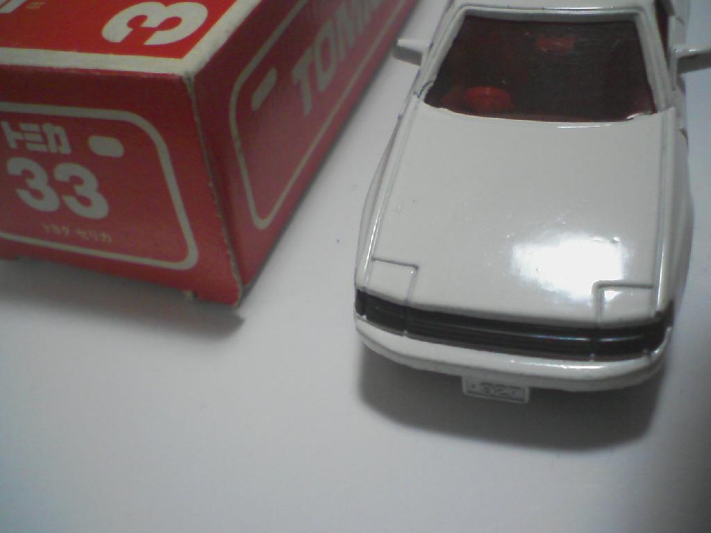 Tomica Made in Japan 33 Toyota Celica scale white with red TOMY logo 1/58