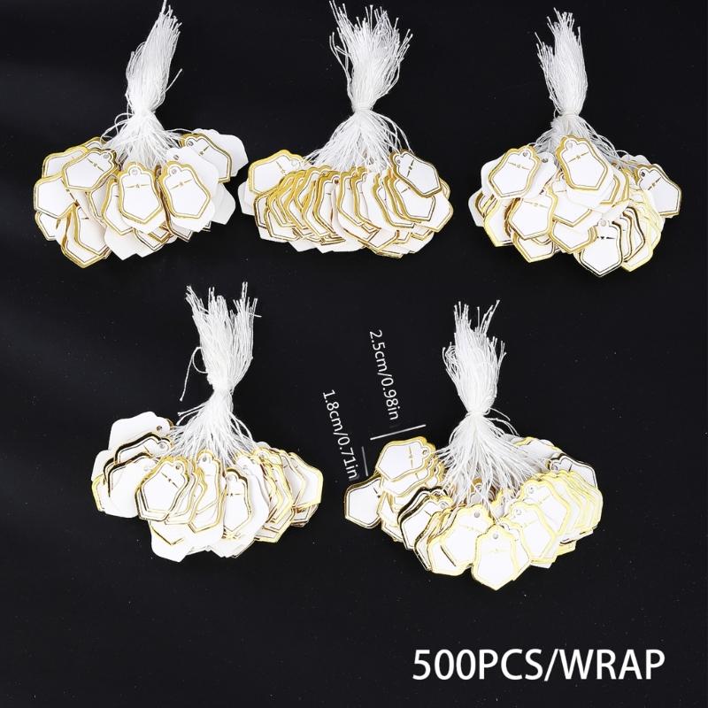Förpackning med 500 st Guld/Silver Pappersstjärna Formade Prislappar Stadigt Papper Förstansade Hål För Detaljhandel Smyckesdisplay Festdekorationer