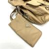 PRADA 1BZ811 Triangle logo Backpack with double pockets and pouch Nylon Beige