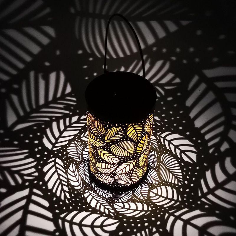 

Wrought Iron Outdoor Solar Lantern: Waterproof Shadow Projector and Garden Light Decor Tree Leaf Projection Light