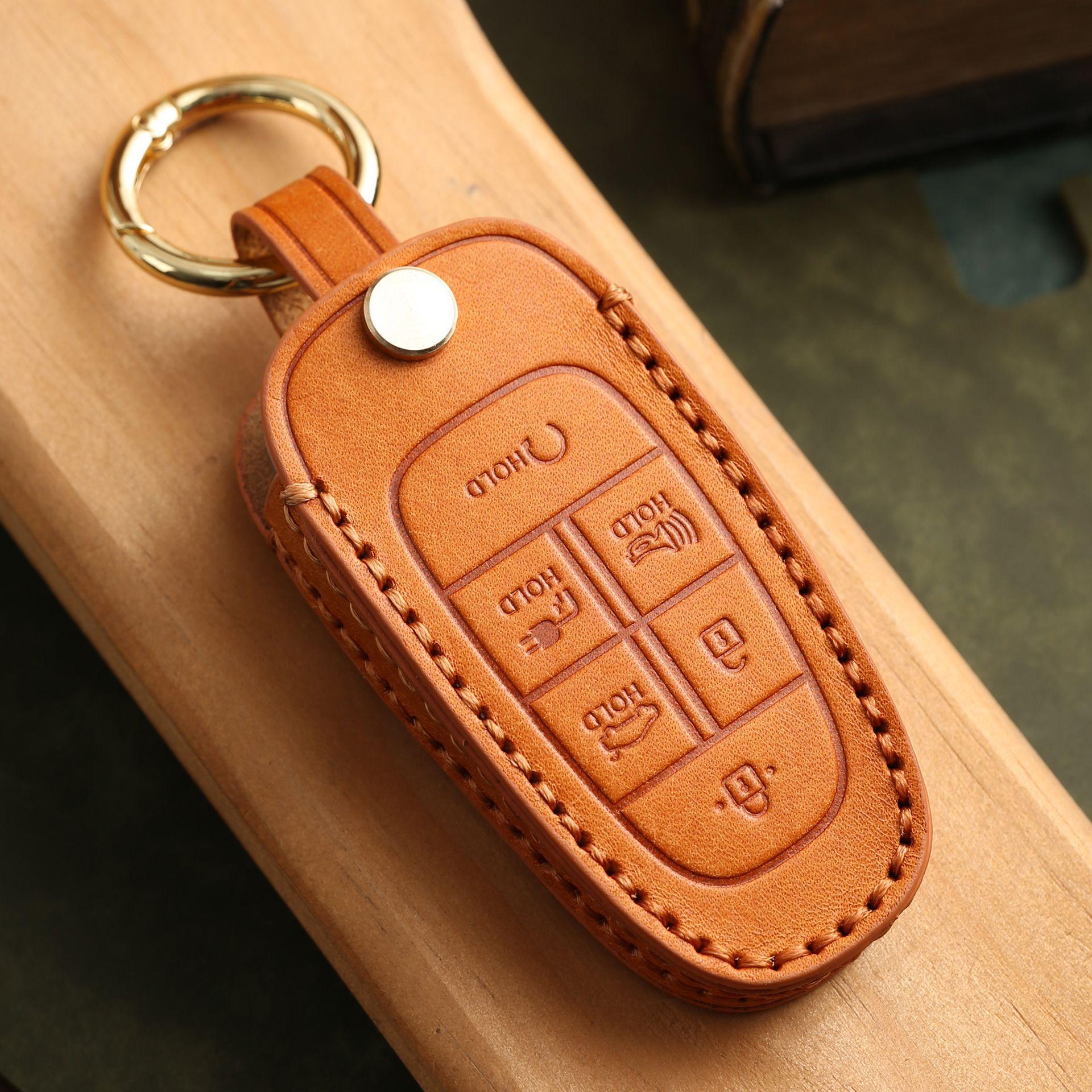 

Индивидуализированный кожаный чехол для ключей подходит для современных автомобилей, с ручной прошивкой, высококлассной защитой ключа, застежкой-ракушкой, из коровьей кожи оранжевый