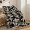 The image features a green, brown, black, and beige camouflage pattern. for all seasons blanket lunch break throw gift