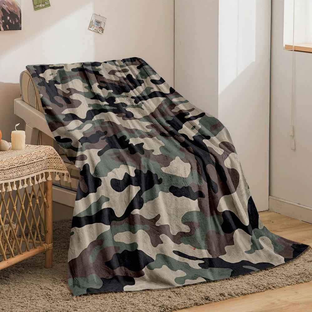 The image features a green, brown, black, and beige camouflage pattern. for all seasons blanket lunch break throw gift