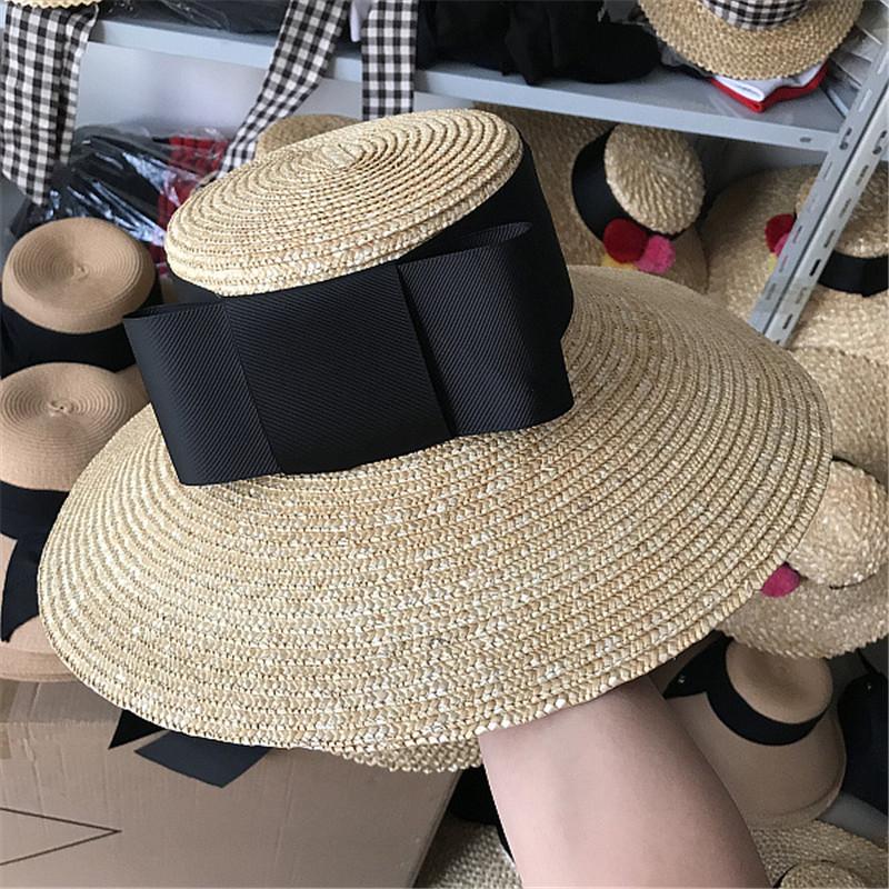 

202507-nu ins chic summer handmade straw wide ribm big bowknot model show lady beach cap leisure sun hat sale 12cm brim