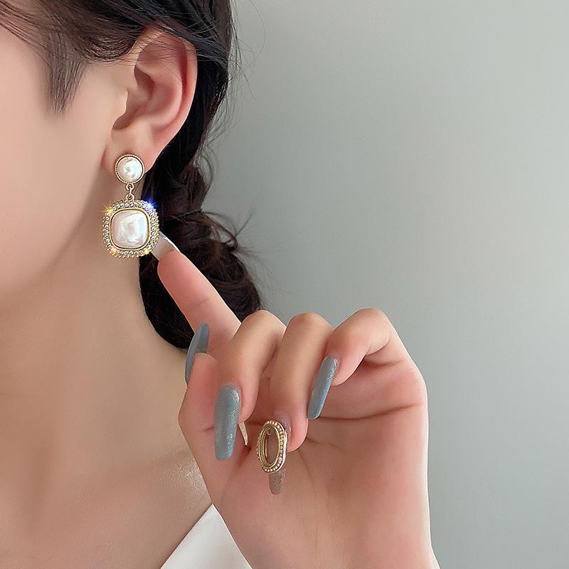 2025 Trendy Luxury French Niche Pearl Earrings for Women - Exaggerated & Versatile