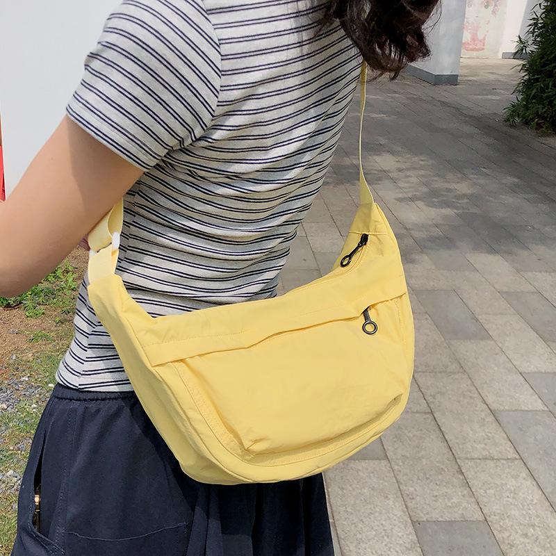 Casual crossbody bag girls lightweight shoulder canvas bag waterproof commuting solid color versatile nylon dumpling bag for men
