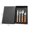 Four-Piece Cutlery Set: Stainless Steel Steak Knife, Fork, Spoon, with Rosewood Handles.