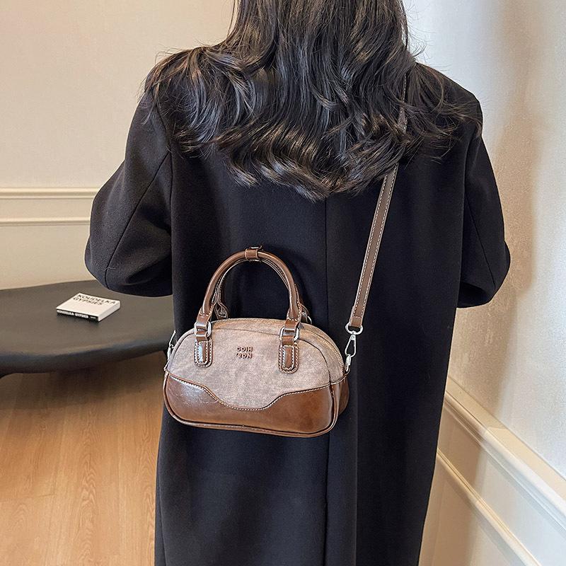 Premium sense retro contrasting color portable bowling bag women 2025 new trendy shoulder bag versatile messenger bag