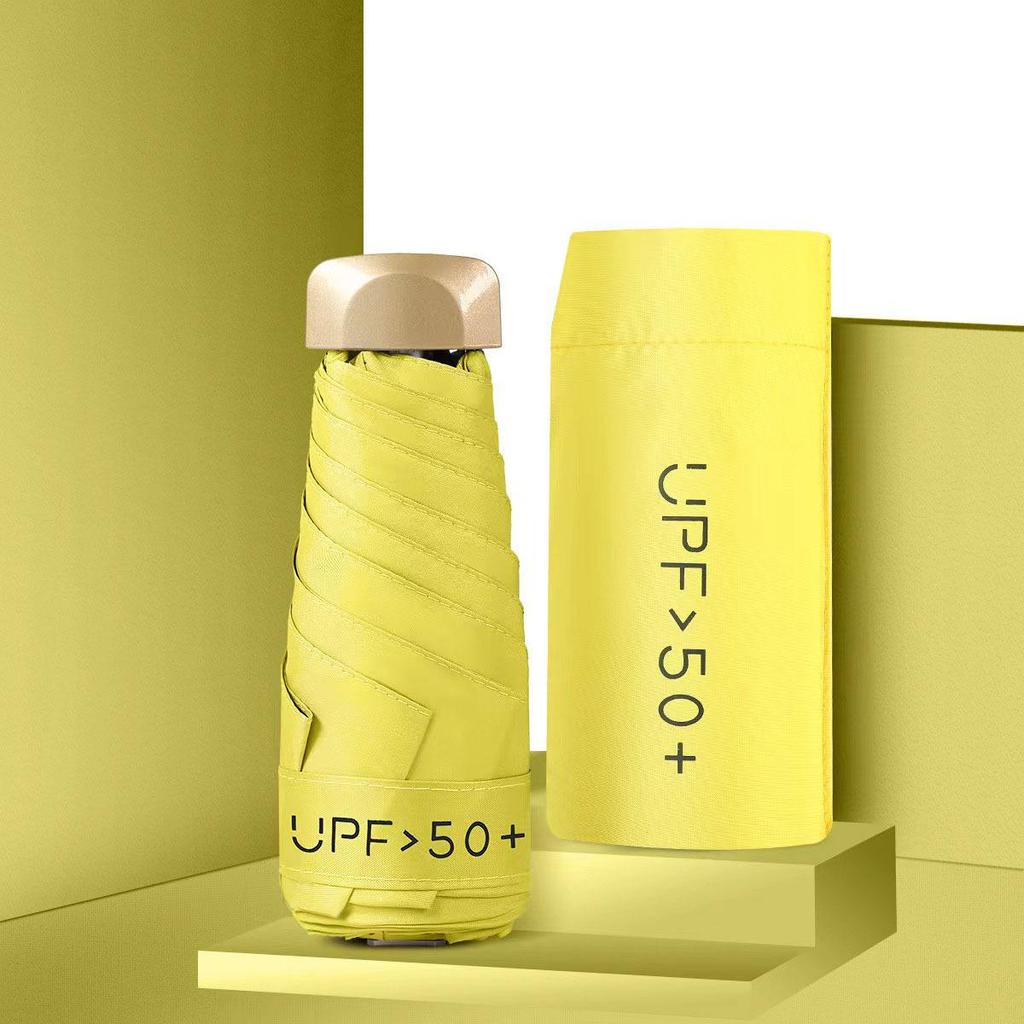 50 % rabatt på svart kapselparaply i lommeformat - Seks-skjerms sammenleggbar for sol og regn