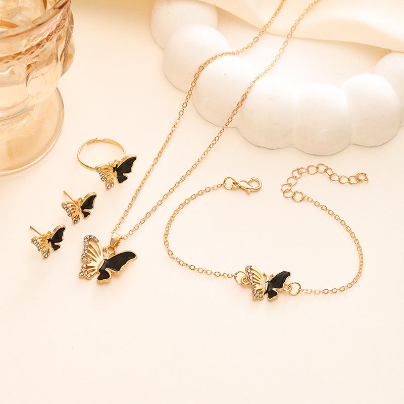 

Элегантный комплект украшений «Бабочка»: Ожерелье, браслет, кольцо, серьги