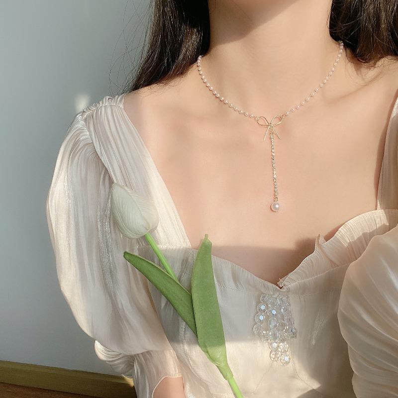 Niche bow pearl necklace female cold wind temperament simple collarbone chain neck chain female