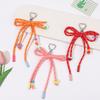 Stylish Candy Color Braided Bowknot Keyring Nylon Weaving Rope Keychain Phone Accessories for Student and Trendsetters
