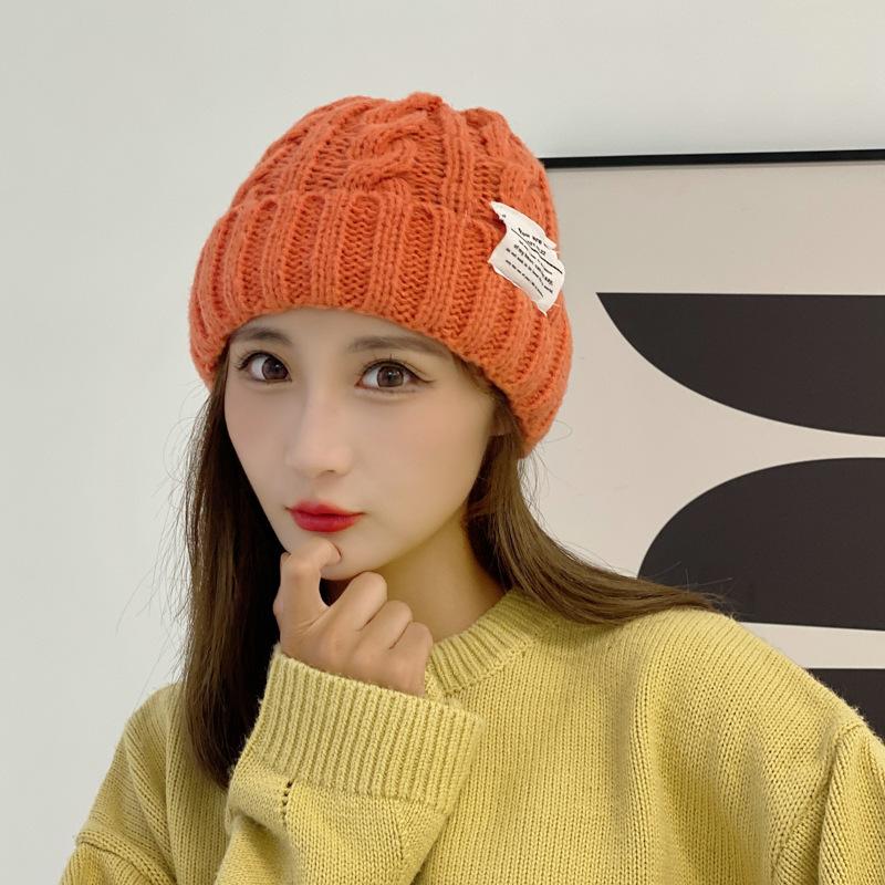 

Зимняя вязаная шапка для женщин, конфетного цвета, шерстяная шапка, теплая шапка-пуловер, однотонная, с косами, для большой головы, с защитой ушей, холодная шапка One size