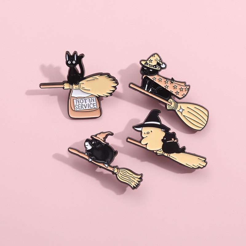 Whimsical Cat Riding Broomstick Brooch Charming Alloy Pin Unique Fashion Accessory