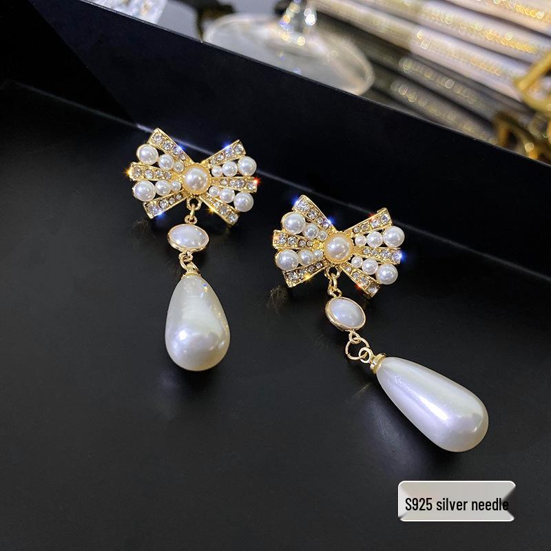 

Жемчужное колье-чокер 2023: Элегантная женская ключичная цепочка для европейского и американского стилей