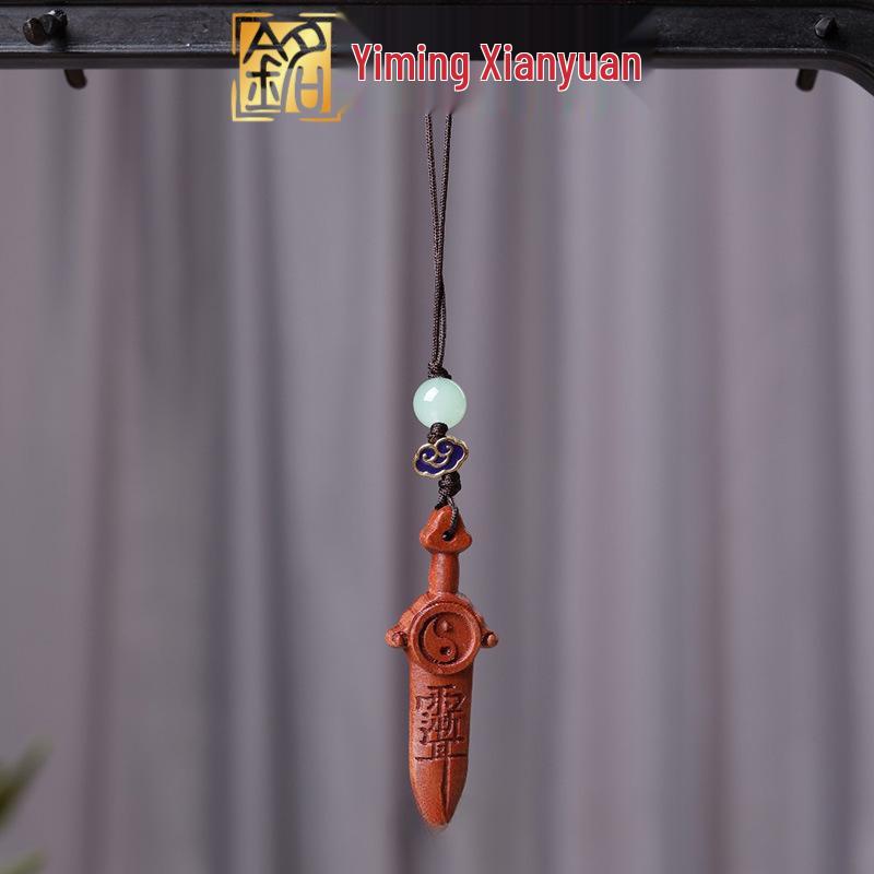 

Jujube Wood Bagua Sword Charm - Carved Ornament for Phone, Bag, or Keychain Approx. 4.8*2cm