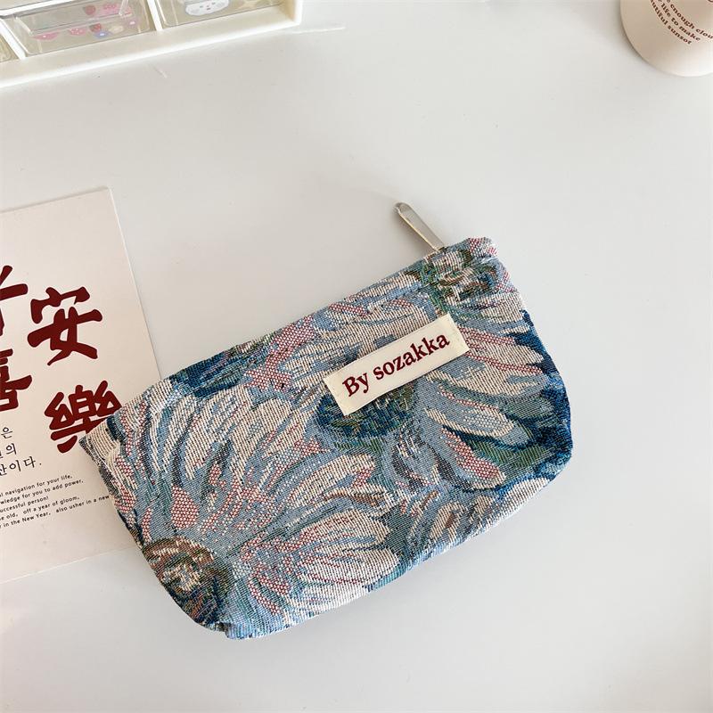 Trendy Ladies Simple And Portable Floral Embossed Cosmetic Bag For Use Everyday
