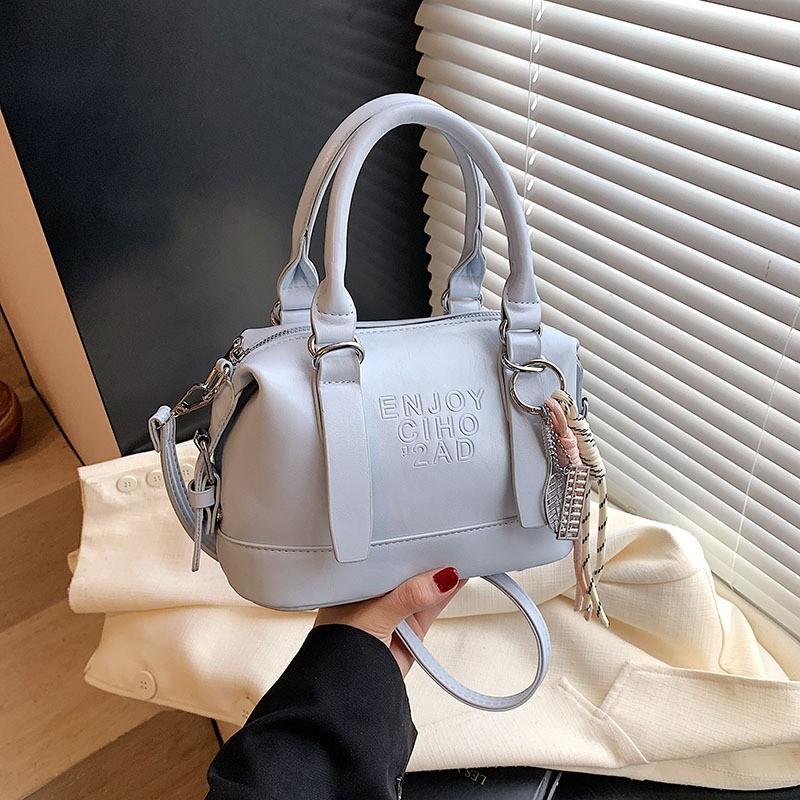 Han simple casual portable women's bag 2026 early spring new fashion commuting solid color versatile shoulder messenger bag bag