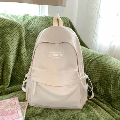 Damen-Rucksack aus solidem Nylon Jugend-Campus Mädchen-Rucksack Niedlicher Anhänger Reißverschlusstasche