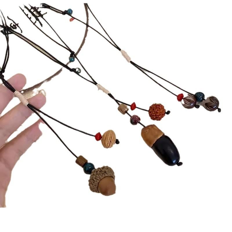 New Chinese ceramic acorn pendant woven rope necklace women's retro ethnic long collarbone chain niche design neck chain
