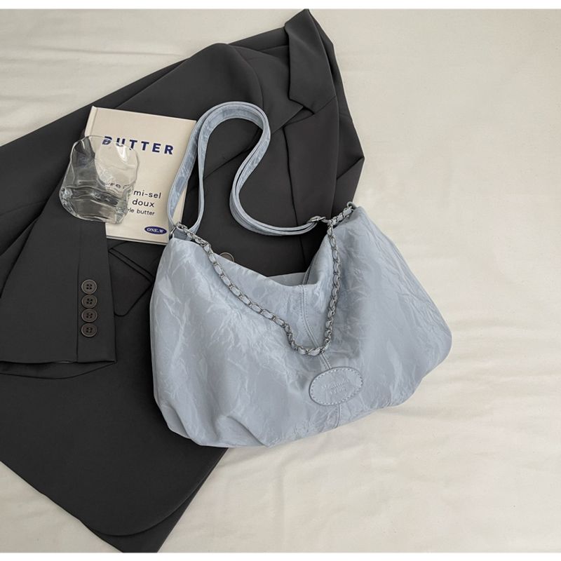 

Популярная сумка этого года, женская, большой вместимости, новинка 2025, повседневная, легко сочетается, на плечо, для студентов, для работы, кроссбоди, сумка-пельмень Blue without pendant