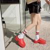 Tongs compensées imperméables style européen pour femme