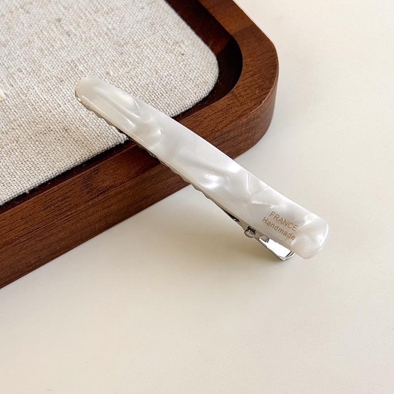 Eine Nische Retro High-End Acetat Wassertropfen Haarspange Pony Seitenclip Einreihige Entenschnabelspange High-End Leichter Luxus Haarclip für Frauen