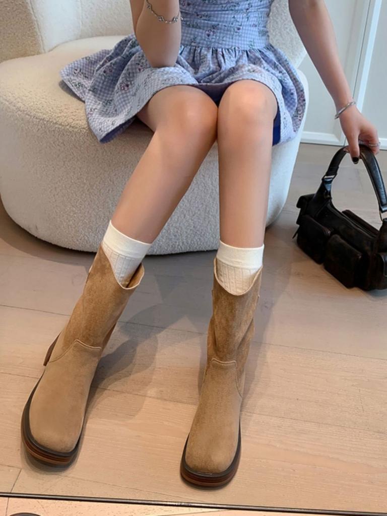 Internet Celebrity Explosion Autumn and Winter Super Fire Pile Boots Women's 2025 Flat-bottomed Short Boots Round Head Sleeve Explosion Tube Boots Ti