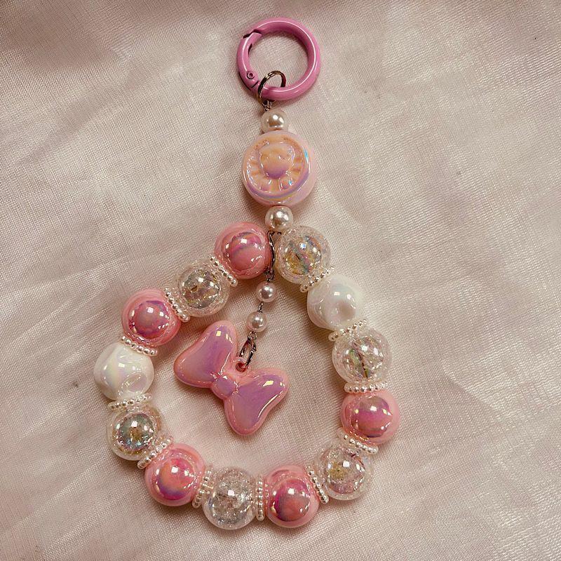 

Ремешок для мобильного телефона, короткий стиль, ремешок на запястье для женщин, бант, цепочка, держащаяся в руке, ремешок с подвеской, защищающий от потери телефона розовый