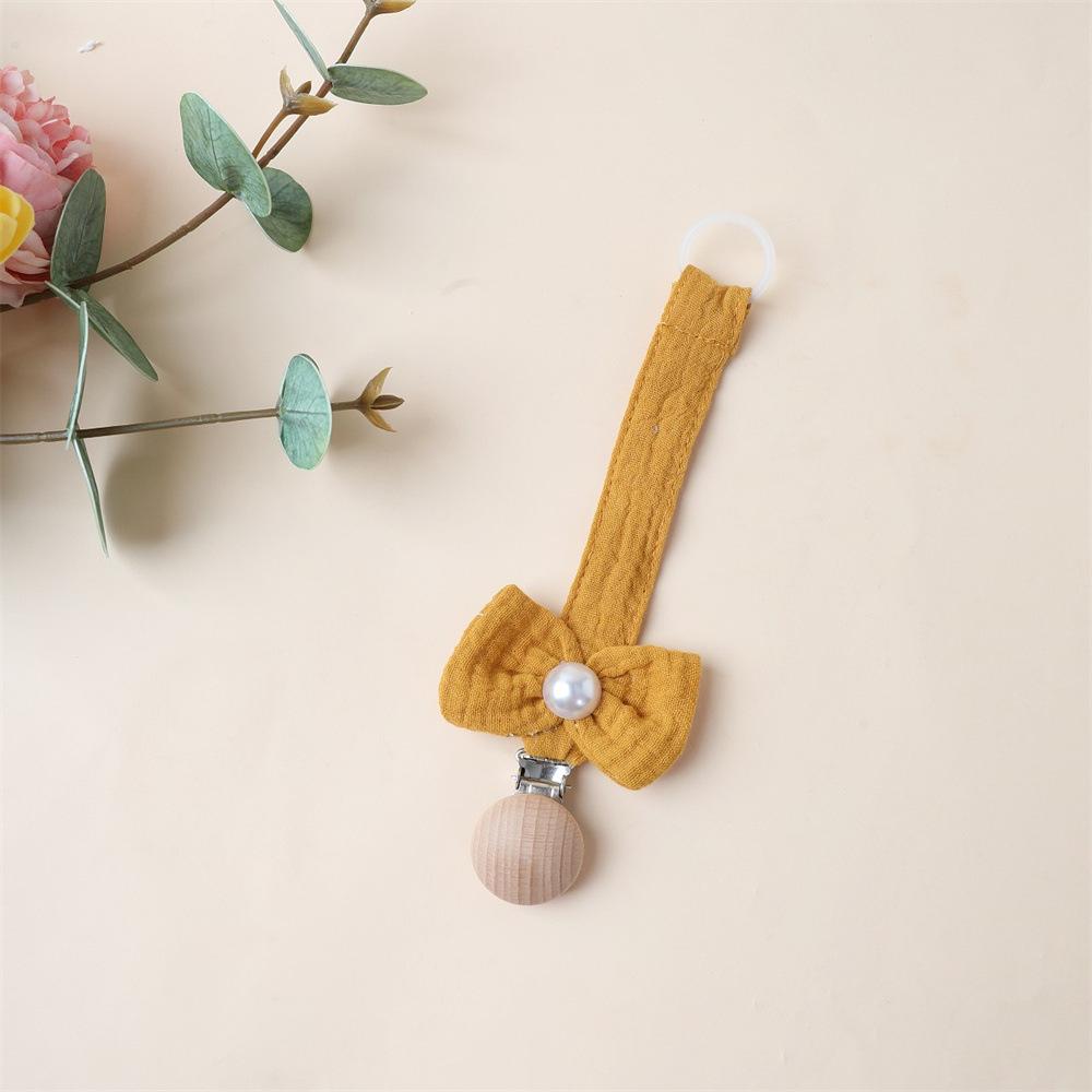 1 Stück Niedlicher Neugeborener Mädchen Schnuller Clip Kette Süße Prinzessin Schleife Schnullerclip Kette Stoff Holz Anti-Verloren Spielzeug Schnullerkette