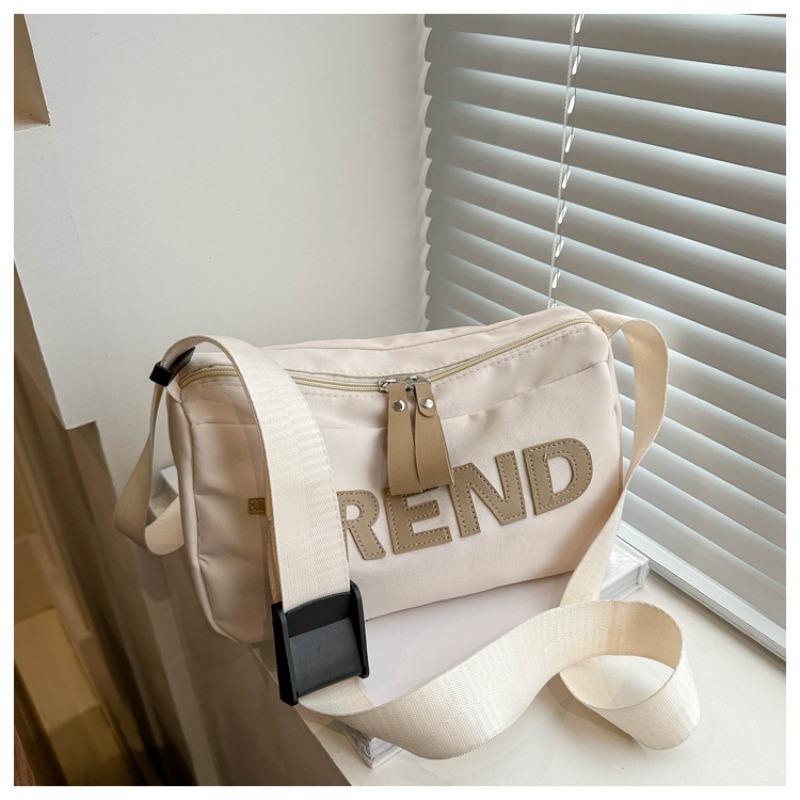

New Oxford cloth bag, letter shoulder bag, male and female couples messenger bag, large capacity holder. білий