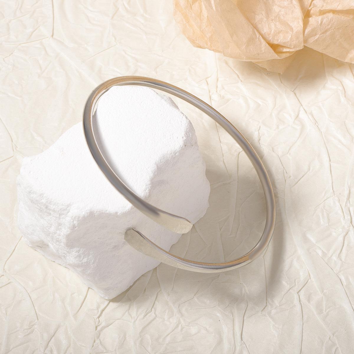 

This fashionable, simple and casual metal creative minimalist design open-top women s bracelet is versatile and suitable for daily wear