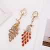 Seven-Color Peacock Tail Keychain: Creative Metal Pendant with Crystals