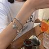 S925 Vintage Strawberry Bear Woven Bracelet for Women - Stylish and Versatile Design.