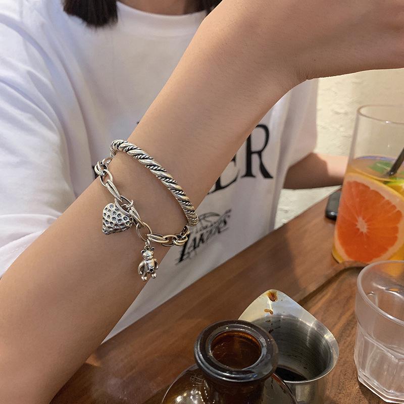 S925 Vintage Strawberry Bear Woven Bracelet for Women - Stylish and Versatile Design.