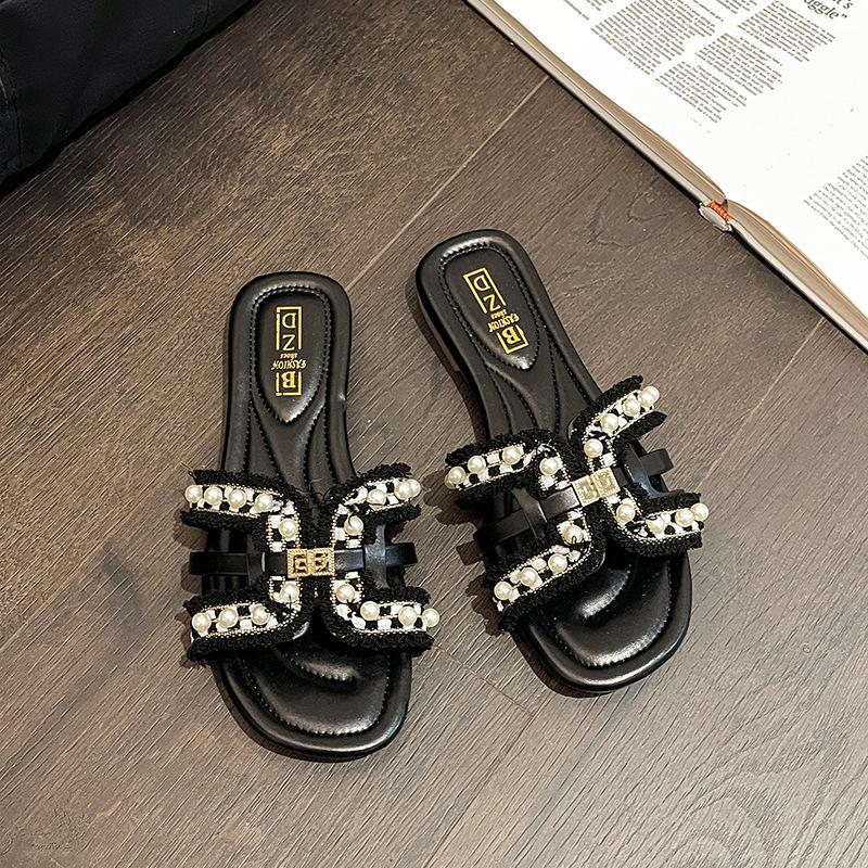 

Сяосянфэн шлепанцы на плоской подошве женские летние с чувством дизайна модные фея стиль мягкая подошва повседневные жемчужные шлепанцы через палец 35