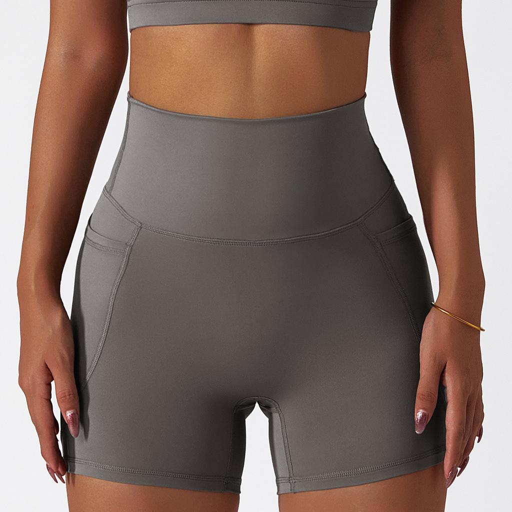 Nya Sommar Snabbtorkande Nuda Sportshorts, Höga Tajta Yogabyxor, Andningsbara Löpar- och Fitnessshorts med Fickor