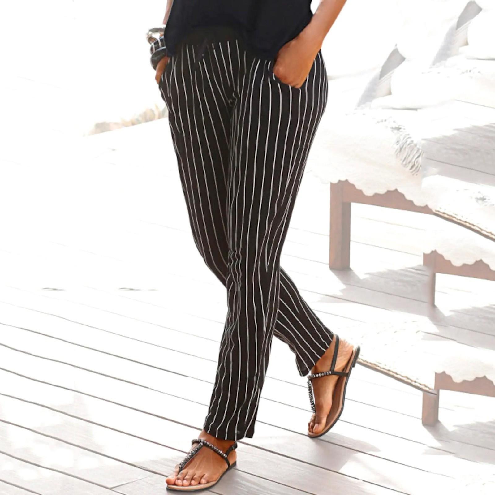 

Женские свободные повседневные спортивные брюки с эластичной лентой и принтом для бега и отдыха M чёрный