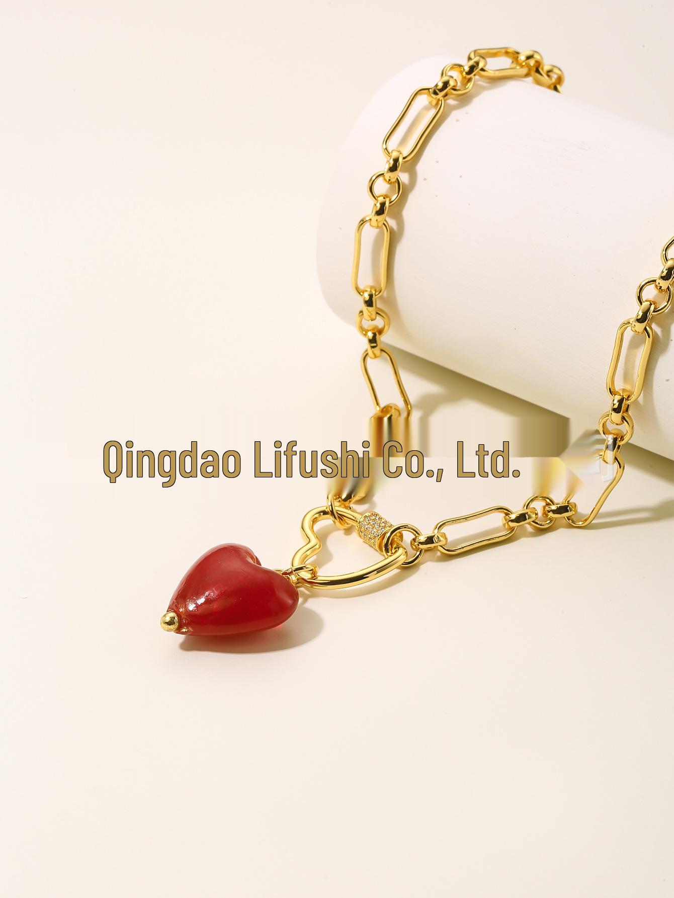 

Набор серьги и ожерелье с синими кристаллами в форме сердца красный