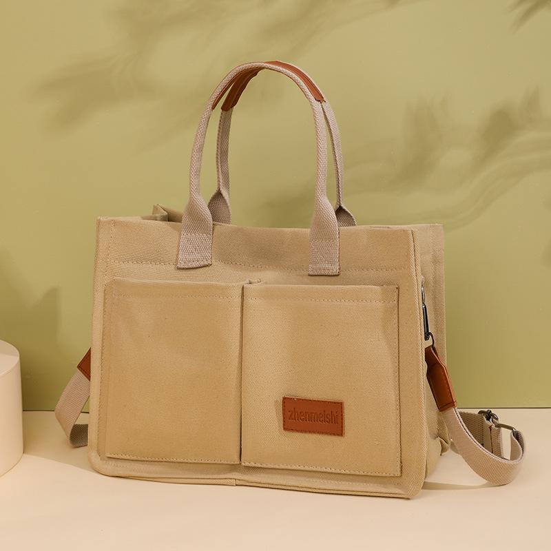 Japanese Minimalist Large-Capacity Crossbody Canvas Backpack & Versatile Tote Handbag.