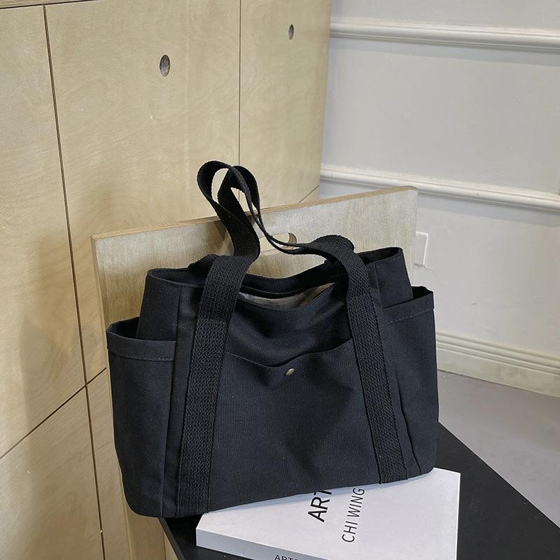 

Canvas bag Women s tote bag Shoulder bag College student handbag Commuter large-capacity make-up bag Multi-pocket tote bag чёрный