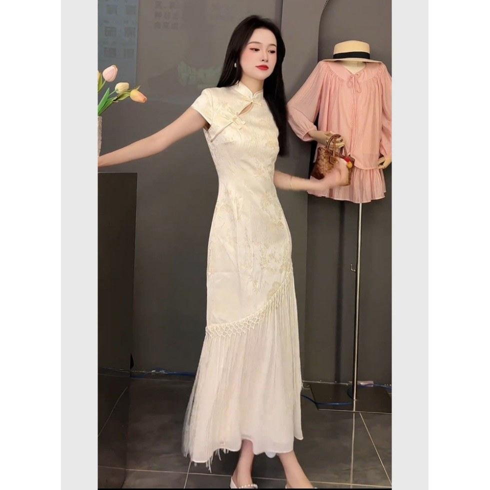 Nuova gonna cheongsam in stile cinese, nuovo temperamento unico e bello, abito beige di alta gamma con vita a intarsio
