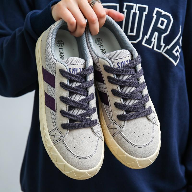 Menn og kvinner anti-skli elskere trend retro fritidssko sommer burst De trening lerret sko net overflate nisje menn sko