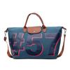 Large capacity short-distance travel bag Women's travel portable tote bag Tide commuter leisure shoulder bag Foreign style messenger bag