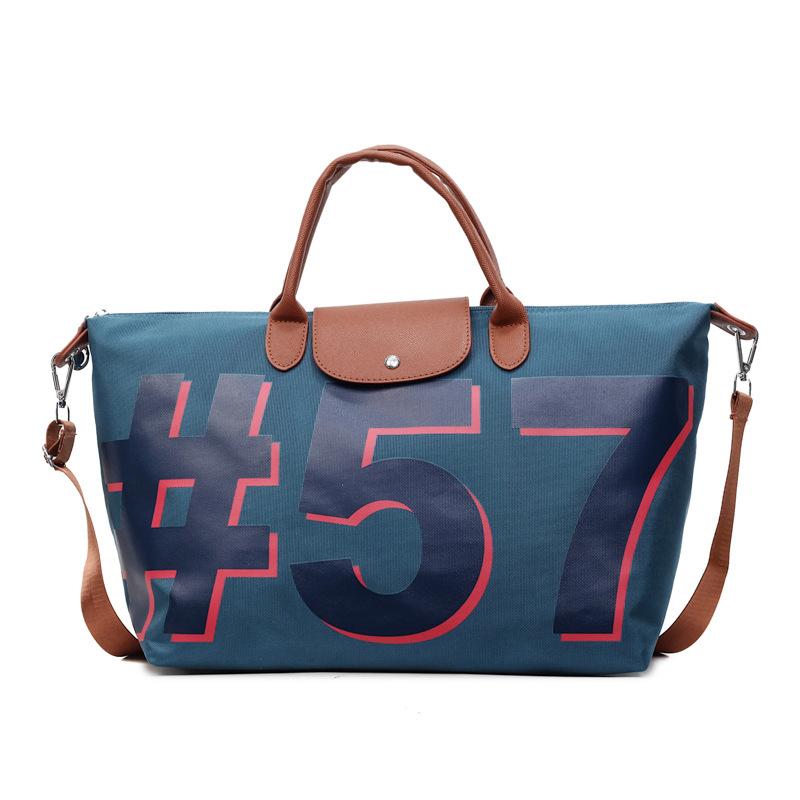 Large capacity short-distance travel bag Women's travel portable tote bag Tide commuter leisure shoulder bag Foreign style messenger bag