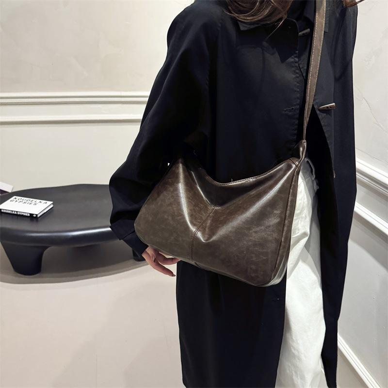 

Новая сумка женская осенне-зимняя текстурная ретро деловая большая вместительная сумка-тоут модная универсальная на плечо через плечо 30*10*25 темно-коричневого