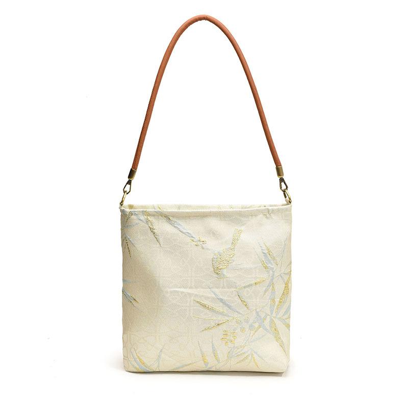 

Сумки женские большой вместимости 2025 новый летний универсальный досуг популярные на плечо сумки-ведра в этом году белый