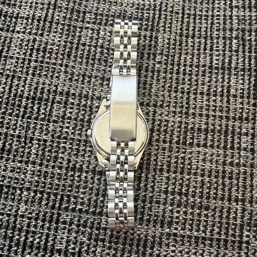 Used and unused CITIZEN sharex Solartech wristwatch silver dial