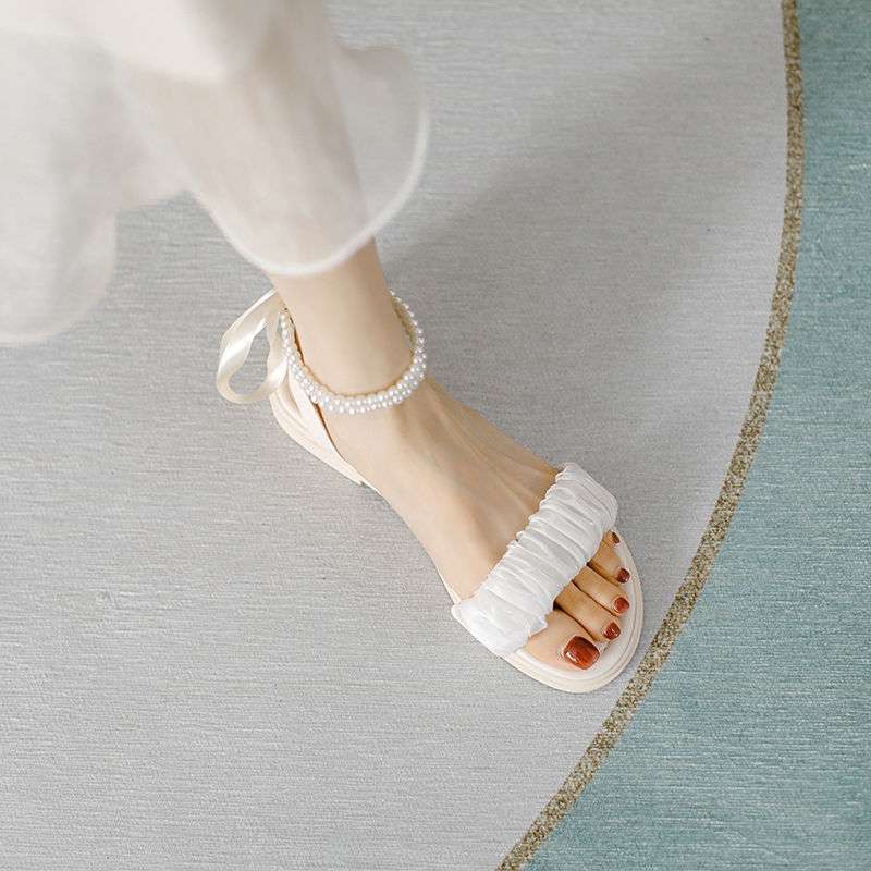 Sandals women's outer wear 2025 summer new versatile ins bow fairy style flat sandals non-slip maternity sandals