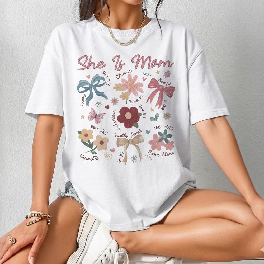 

She Is Mom Christian Bible Verse Shirt Floral Bow Mothers Day Gift Graphic Tee Unisex T-Shirt XL
